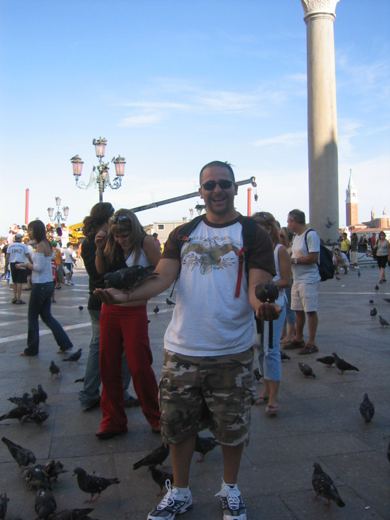 Dave feeding the flying rats in Europe